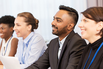 Image showing happy business team at international conference