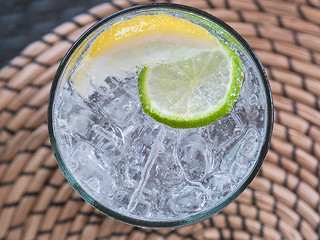 Image showing Glass of soda water with ice and lime