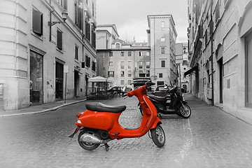 Image showing Small red motorbike 