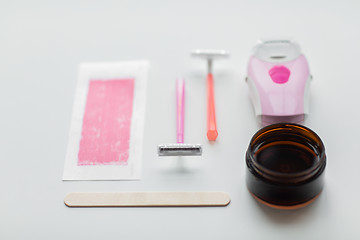 Image showing safety razor, epilator, hair removal wax and patch