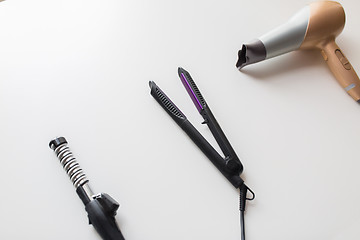 Image showing hairdryer, hot styler and curling iron or tongs