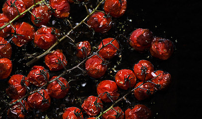 Image showing Small red oven-baked tomatoes