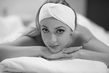 Image showing woman laying on massage table