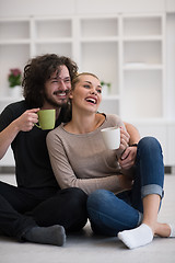 Image showing young couple in their new home