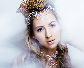 Image showing beauty young snow queen with hair crown on her head, complicate 