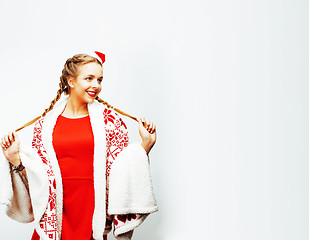 Image showing young pretty happy smiling blond woman on christmas in santas re