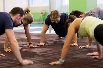 Image showing group of people exercising in gym