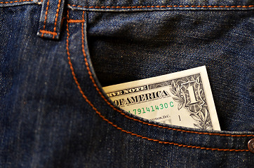 Image showing Jeans pocket with one dollar banknotes