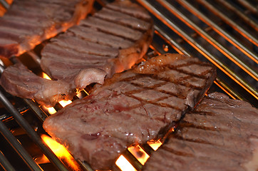 Image showing Beef steaks on the grill