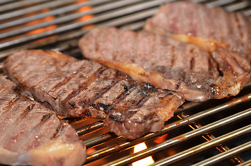 Image showing Beef steaks on the grill