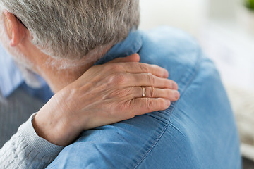 Image showing close up of married senior couple hugging