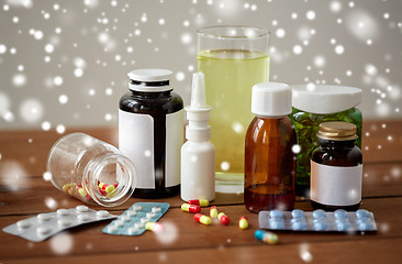 Image showing medicine and drugs on wooden table