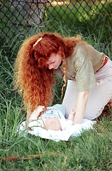 Image showing Baby abandoned in the woods.