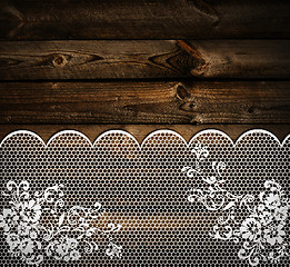 Image showing wooden background with lace