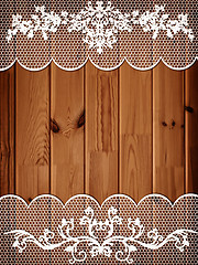 Image showing wooden background with lace frame