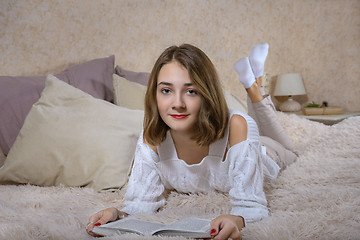 Image showing A girl with a book