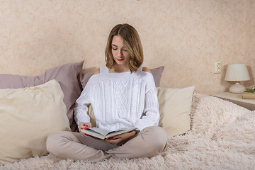 Image showing A girl with a book