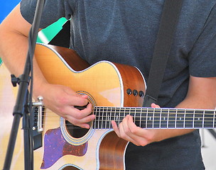 Image showing Male guitarist.