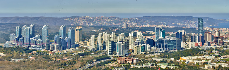 Image showing Istanbul, Turkey - April 3, 2017: Skyscrapers in the Maslak. Shooting through the glass. Retro style.