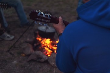 Image showing guitar near the campfire