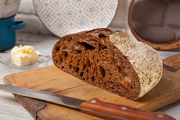 Image showing Homemade rye bread on old cutting board