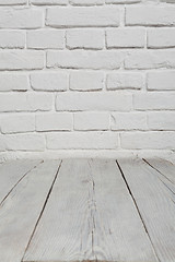 Image showing Old white brick wall and wood floor background