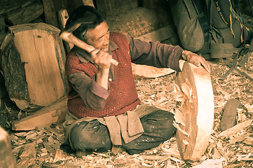 Image showing Man with axe in Nepal