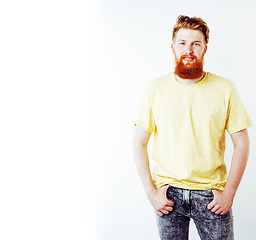 Image showing young handsome hipster ginger bearded guy looking brutal isolate