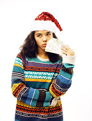Image showing cute young real african hipster girl in santas red hat isolated 