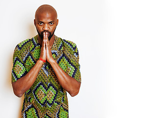 Image showing portrait of young handsome african man wearing bright green nati