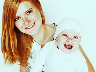 Image showing young beauty mother with cute baby, red head happy modern family