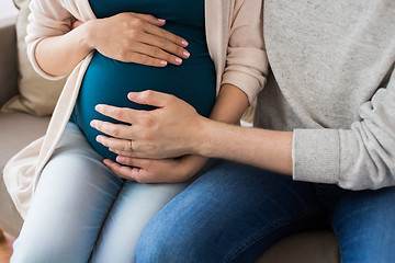 Image showing close up of man and pregnant woman