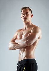 Image showing young man or bodybuilder with bare torso