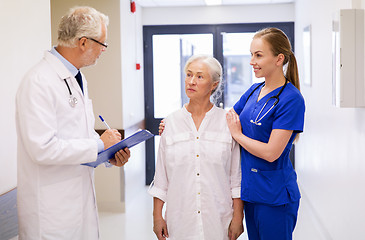 Image showing doctor, nurse and senior woman patient at hospital