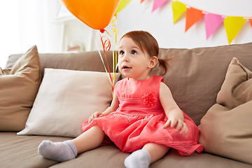 Image showing happy baby girl on birthday party at home