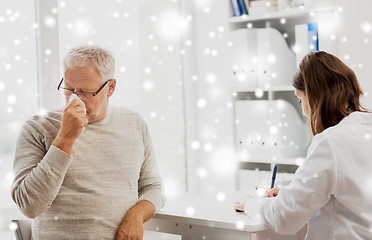 Image showing senior man and doctor meeting at hospital