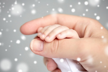 Image showing close up of mother and newborn baby hands