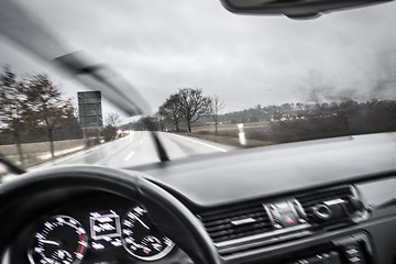 Image showing View from a moving car in the rain