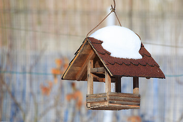 Image showing birdhouse in winter garden