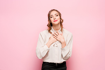 Image showing The young woman\'s portrait with happy emotions