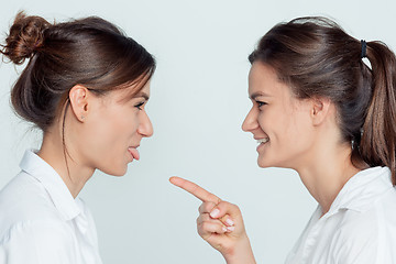 Image showing Studio portrait of female twins