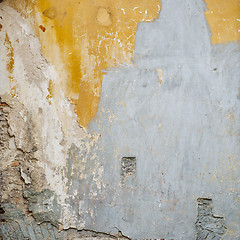 Image showing colorful abandoned cracked brick stucco wall background