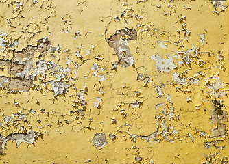 Image showing Yellow painted stucco wall