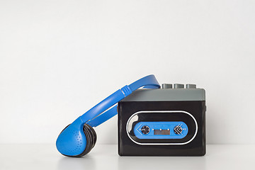 Image showing Retro walkman and headphones on the shelf