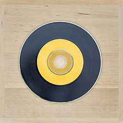 Image showing Black and yellow cd looks like vinyl