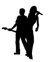 Image showing Female singer and male guitar player back to back