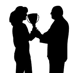 Image showing Female winner receiving trophy from president director or sponsor