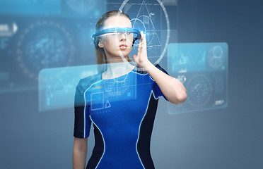 Image showing woman in virtual reality 3d glasses with charts