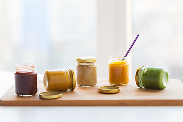 Image showing vegetable or fruit puree or baby food in jars