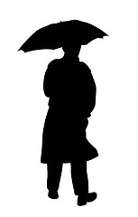 Image showing Man in raincoat with umbrella